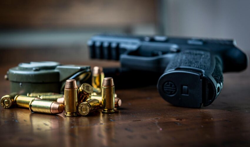 Pistol with bullets Pistol with bullets